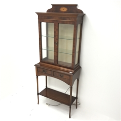20th century inalid mahogany display cabinet on stand, two doors enclosing two glazed shelves above two cupboards, turned supports joined by undertier, W66cm, H165cm, D32cm