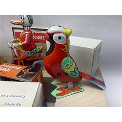Twenty six tinplate models to include Ferris Wheel and Performing Circus Elephant, marked JW, further similar examples such as Duck on a Bike, Clown on Roller, Carousel; Popeye Tin Speedboat; Looney Tunes Wind Up Cars and Express Train; various international examples, MS107 Jumping Bambi, Pop Pop Boat, jumping frogs, pecking chickens etc; both boxed and loose