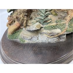 Country Artists figure of a peregrine falcon ' Lord of the Skies ' by David Ivey, limited edition, H44cm, together with two Sherratt and Simpson figures, both of peregrine falcons perched on branches. 