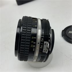 Nikon F3T camera body, in champagne/ titanium colourway, serial no. T8215031, with 'Nikon Nikkor 50mm 1:1.4' lens, Nikon MD4 motor drive, serial no. 156592 and Nikon MK-1 Firing range converter, all with original boxes 