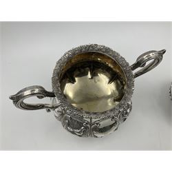 Victorian silver three piece tea service, comprising teapot, twin handled open sucrier, and milk jug, each of bellied form with acanthus capped scroll handles, the sides embossed with alternating scroll edged vacant panels and panels containing a pair of birds, upon four palmette feet, the teapot with ivory insulators to handle, and bird finial to the hinged domed cover, hallmarked William Hunter & Son, London 1861, teapot H19cm, including handles sucrier H13.5cm, including handle milk jug H12cm

This item has been registered for sale under Section 10 of the APHA Ivory Act