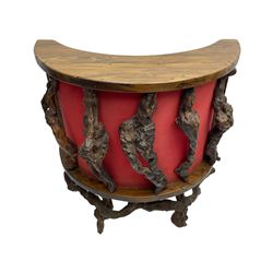 Mid-20th century French grapevine and walnut bow-front wine tasting bar, the curved counter top supported by sculptural grapevine roots, fitted with single shelf and raised on rustic vine feet (W100cm H101cm); with a pair of matching bar stools, the circular top raised on three gnarled root supports united by stretchers (W50cm H70cm)