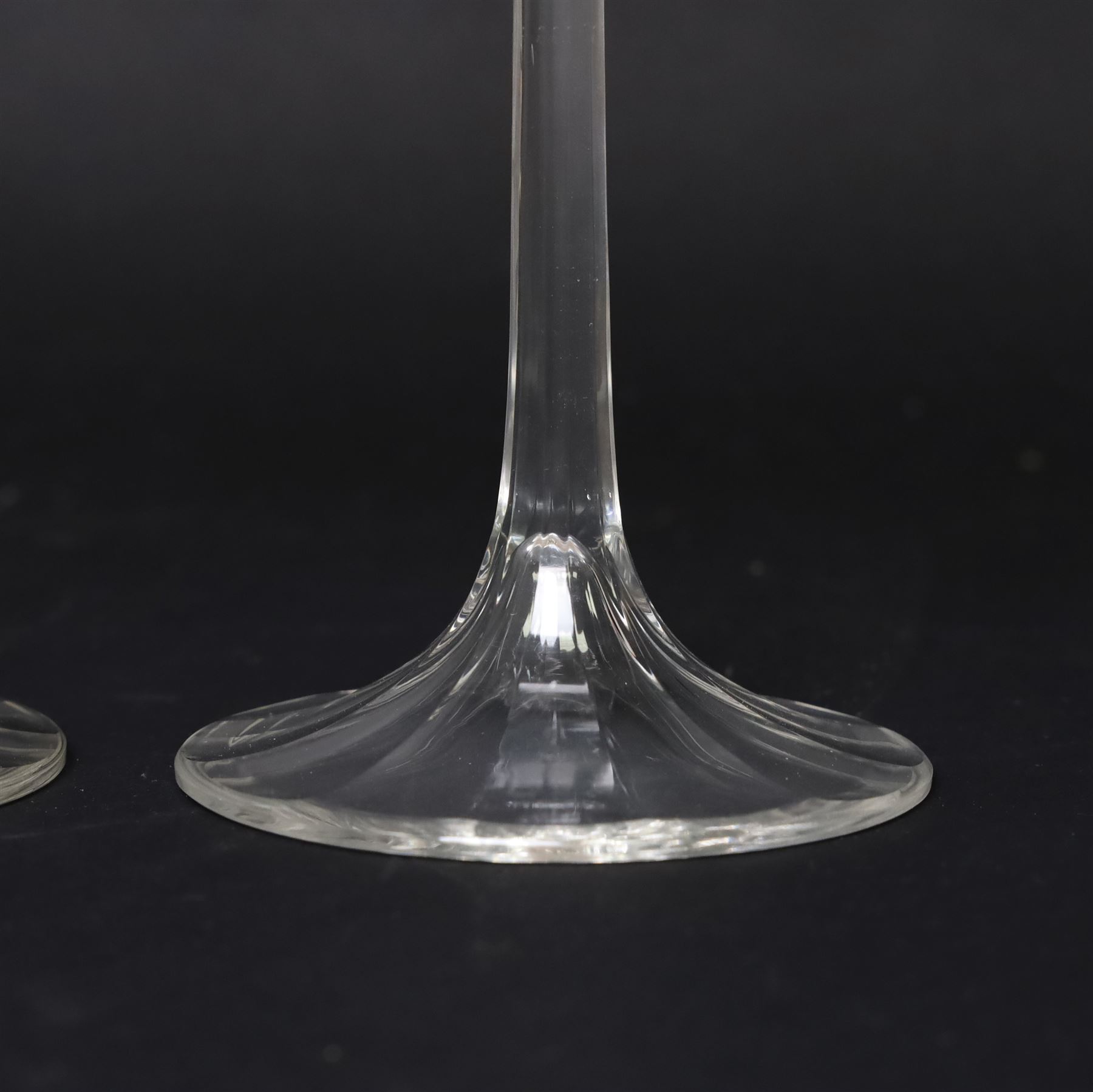 Otto Prutscher (1880-1949) - pair of early 20th century crystal wine glasses with citrine coloured ovals to the bowl and yellow stained at the top of the stem on a trumpet shape foot H21cm 
Notes: The glasses were probably made at the Meyr's Neffe glassworks, Adolf, Bohemia for the retailer E Bakalowits & Sohne, Vienna circa 1909