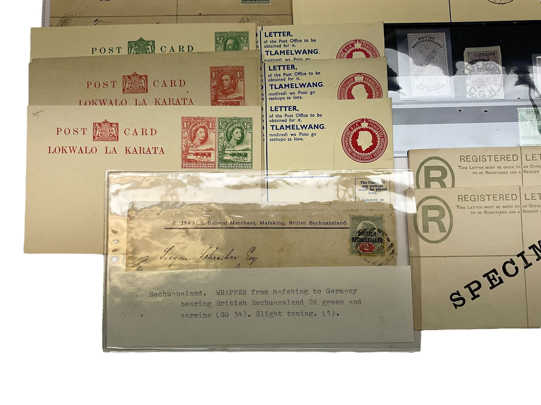 Mostly Bechuanaland Queen Victoria and later stamps, including wrapper from Mafeking to Germany with Bechuanaland two pence, King George V Bechuanaland Protectorate overprints on seahorses with half crown and five shillings values, various items of postal stationary, Airmail letters etc