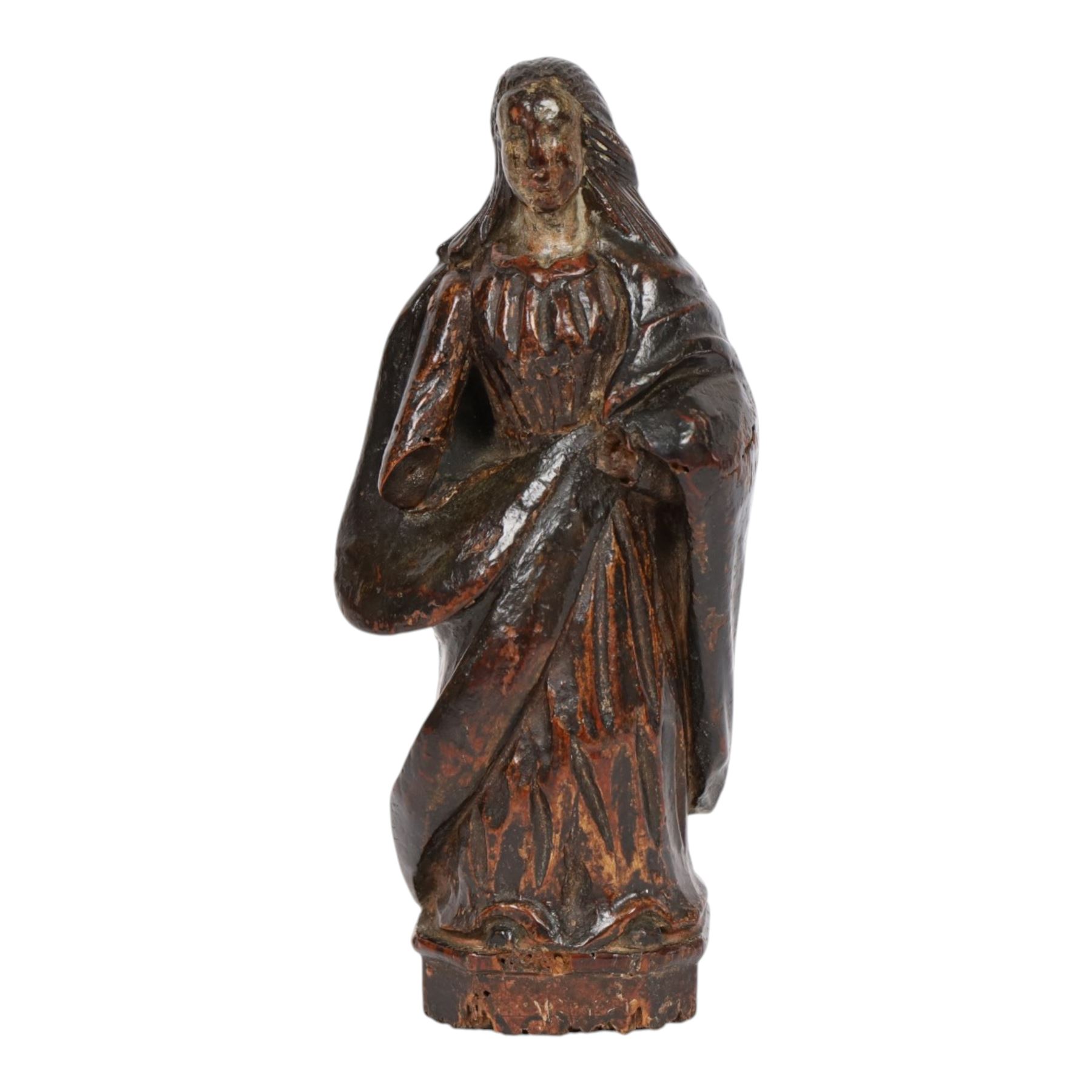 17th century carved limewood figure of a saint, with traces of original polychrome painted decoration, H20.5cm