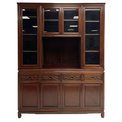 Hong Kong hardwood wall display cabinet, the top section enclosed by four glazed doors, the lower section fitted with four drawers and two double cupboards with panelled doors