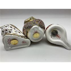 Three Royal Crown Derby paperweights, comprising Owl, Song Thrush and Robin, all with gold stoppers and printed marks beneath, H12cm