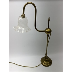 A brass students lamp, with adjustable swan neck and crackle effect clear glass frilled shade, H70cm.