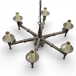 20th century wrought iron six branch chandelier, the central baluster stem issuing six scrolling arms supporting circular drip pan with drop terminals