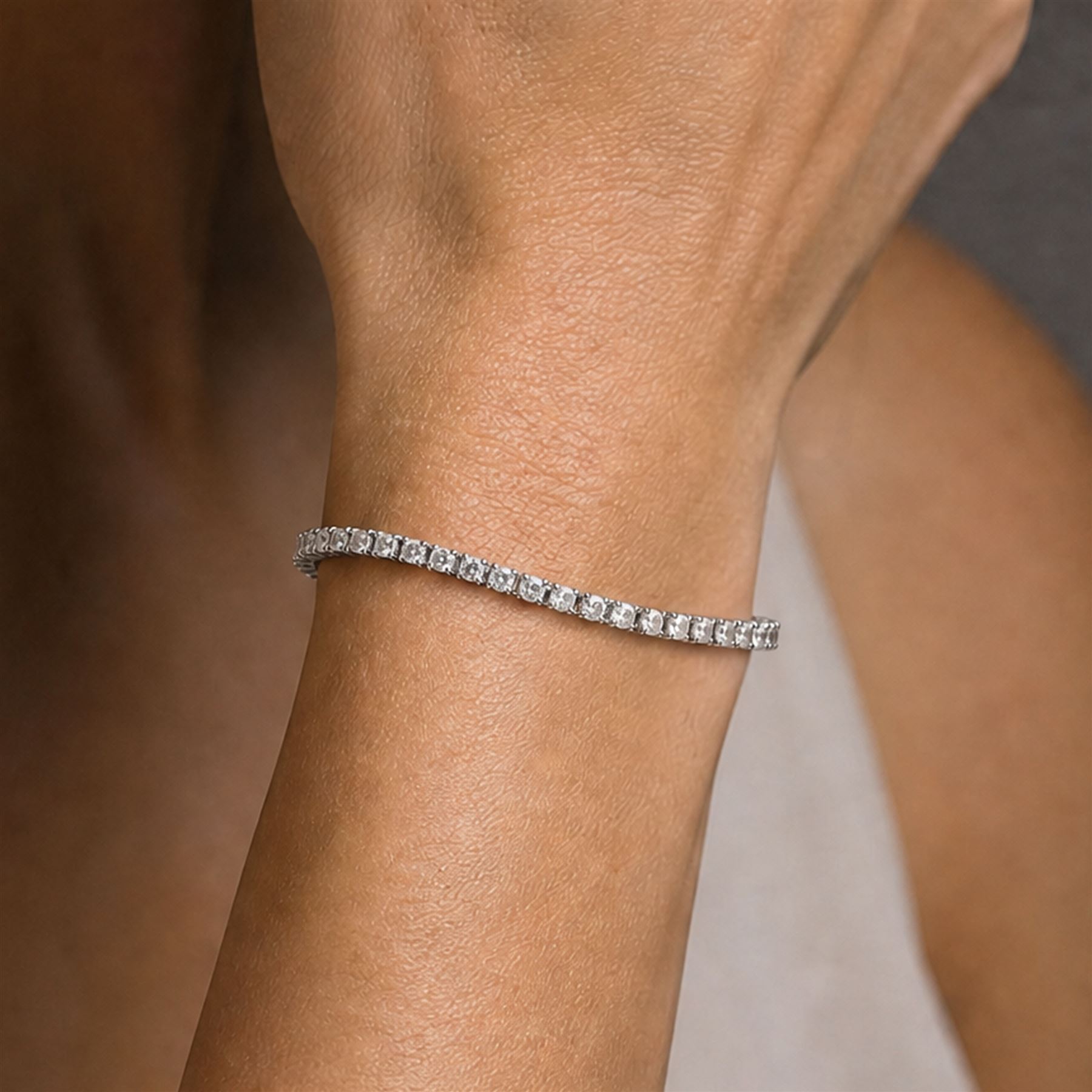 18ct white gold diamond bracelet, fifty-nine round brilliant cut diamonds, stamped 750, total diamond weight 4.29 carat