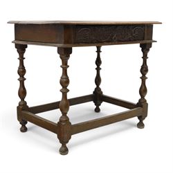 18th century oak lowboy, rectangular top with moulded edge, fitted with single frieze drawer carved with scrolling fruiting vines and stylised plant motifs, raised on bobbin-turned supports united by box stretcher 