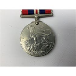 WW2 War Medal 1939-45 and Defence Medal with slip in un-named issue box.