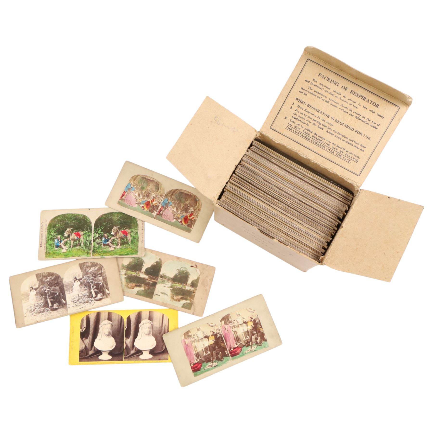 Victorian walnut stereoscope and a collection of slides, including travel, street scenes and landmarks