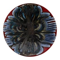 Poole pottery, Delphis Volcano pedestal dish, Delphis charges, in blues and black on a red ground, shape four and another plate, pedestal dish D23cm 