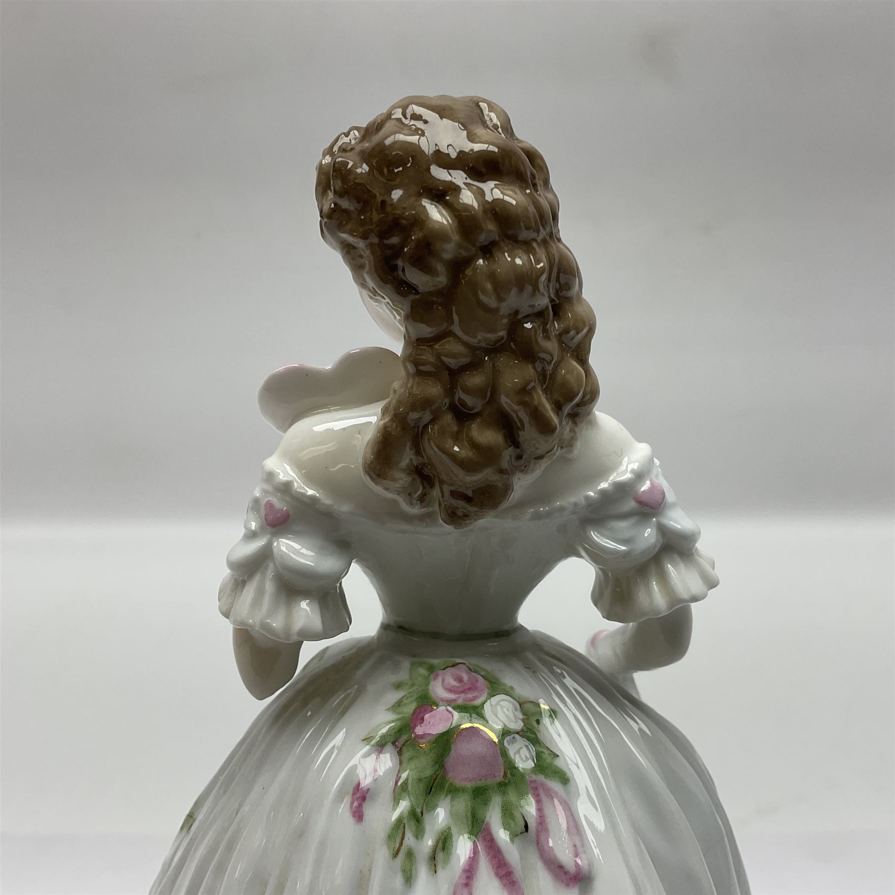 Three Royal Worcester figurines,  The First Quadrille, The Fairest Rose and Queen of Hearts, largest H21cm