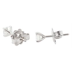 Pair of 18ct white gold round brilliant cut diamond stud earrings, stamped, total diamond weight approx 0.50 carat
