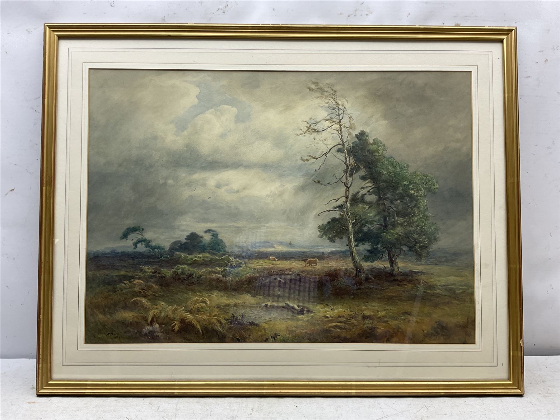 Frederick Dove Ogilvie (British 1850-1921): A Windswept Moor, watercolour signed with initials and dated 1909, 49cm x 70cm