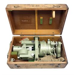 Vickers Instruments England Cooke V22 surveyor's theodolite, No.V.221387, with green enamelled body H32cm; in fitted wooden carrying box with retaining bar and repair label dated 3/8/77.