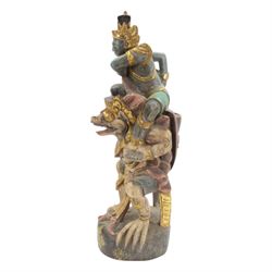 Hindu wooded sculpture depicting Vishnu riding on the shoulders of Garuda, H80cm