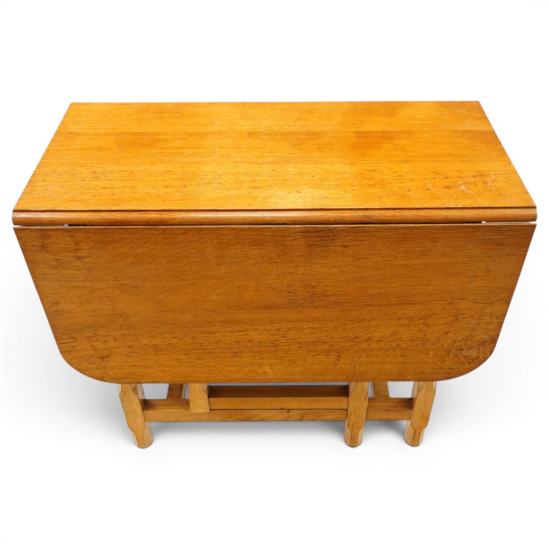Beaverman - 1980s adzed oak drop-leaf dining table with gate-leg action, adzed top and leaves extending to 129cm, octagonal supports with large Beaver carving, by Colin Almack of Sutton near Thirsk 