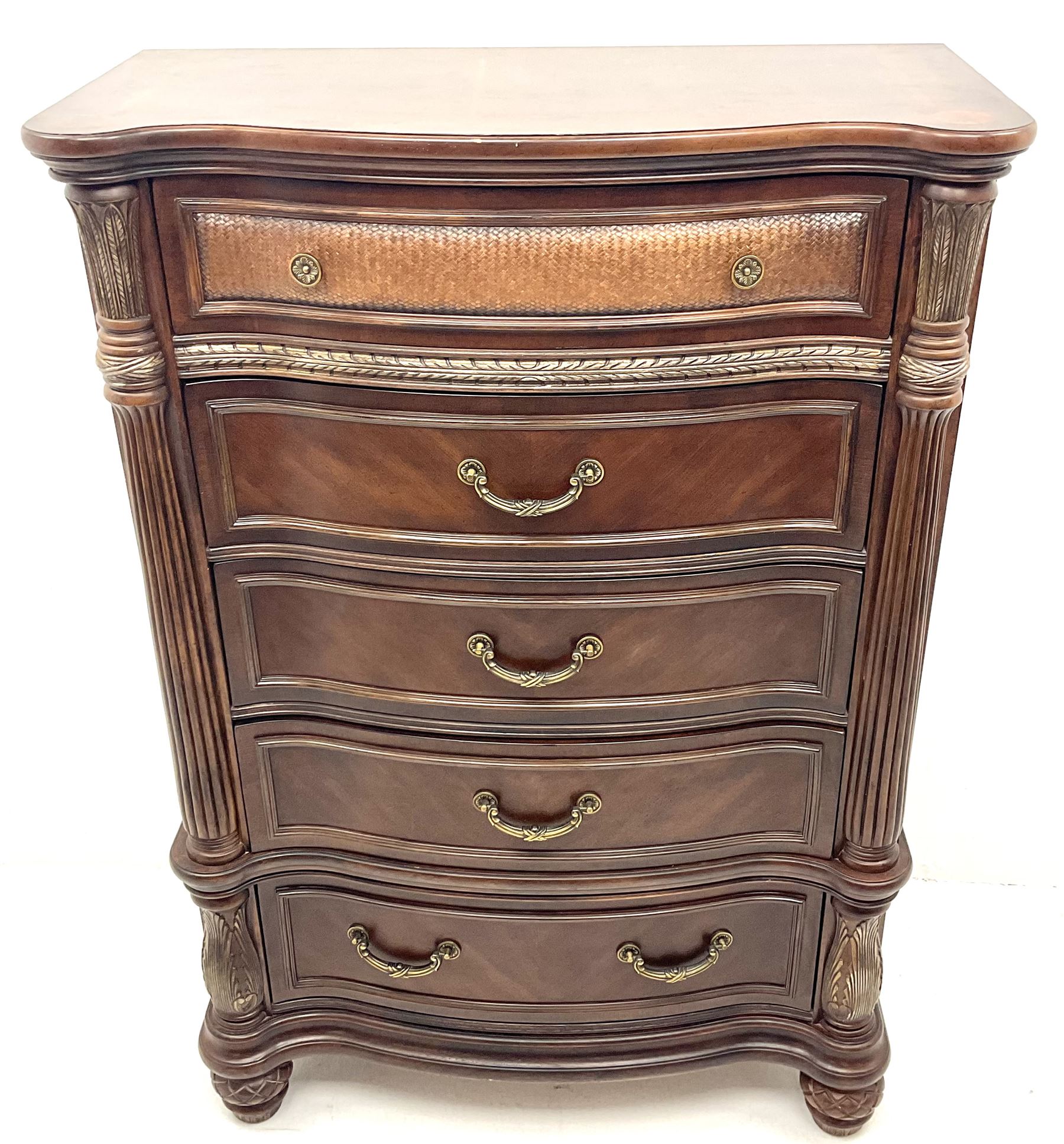 Kevin Charles American walnut serpentine chest, five graduating drawers, half turned fluted column carving, turned supports 