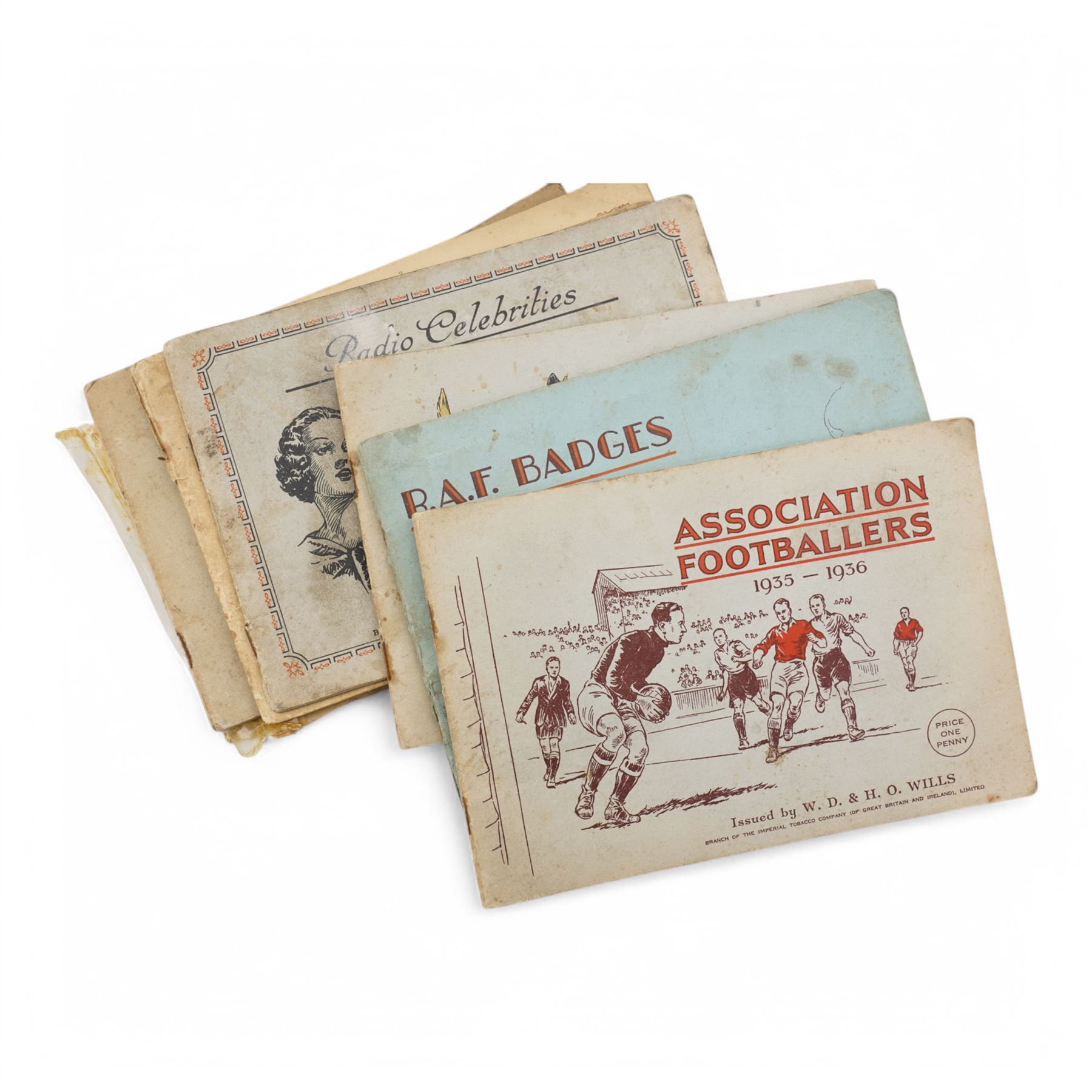 Large collection of cigarette cards, comprising approximately seventeen albums including RAF badges, Association Footballers 1935-1936, Air Raid Precautions, Motor Cars, and various other 'Wild Woodbine' boxes 