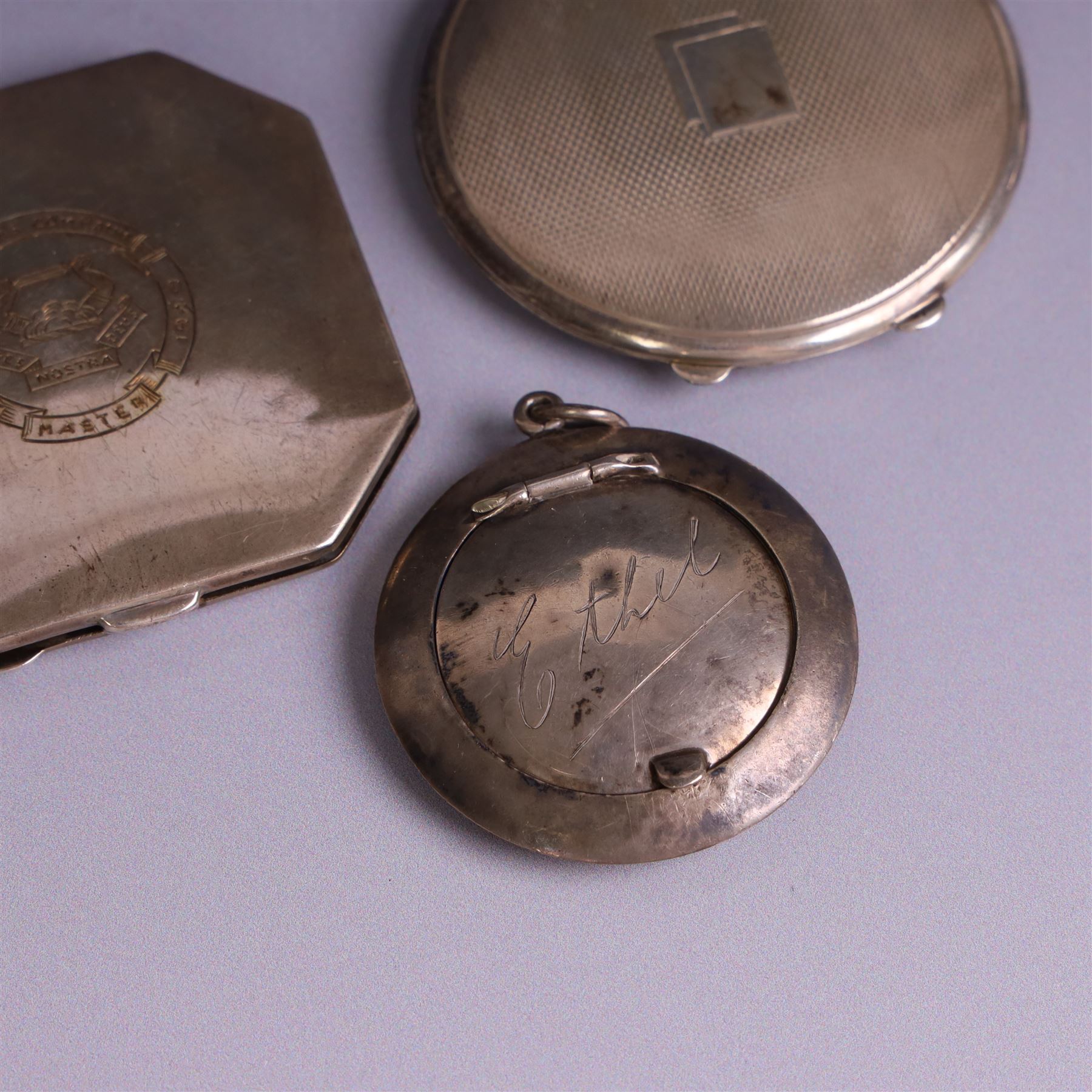 Two silver powder compacts, including octagonal example with Curriers Company engraving, Deakin & Francis Ltd, Birmingham 1948, 1930s circular compact with engine turned decoration, hallmarked Turner & Simpson Ltd, Birmingham 1936 and a silver pill box engraved with name
