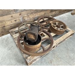 Various cast iron implement wheels
