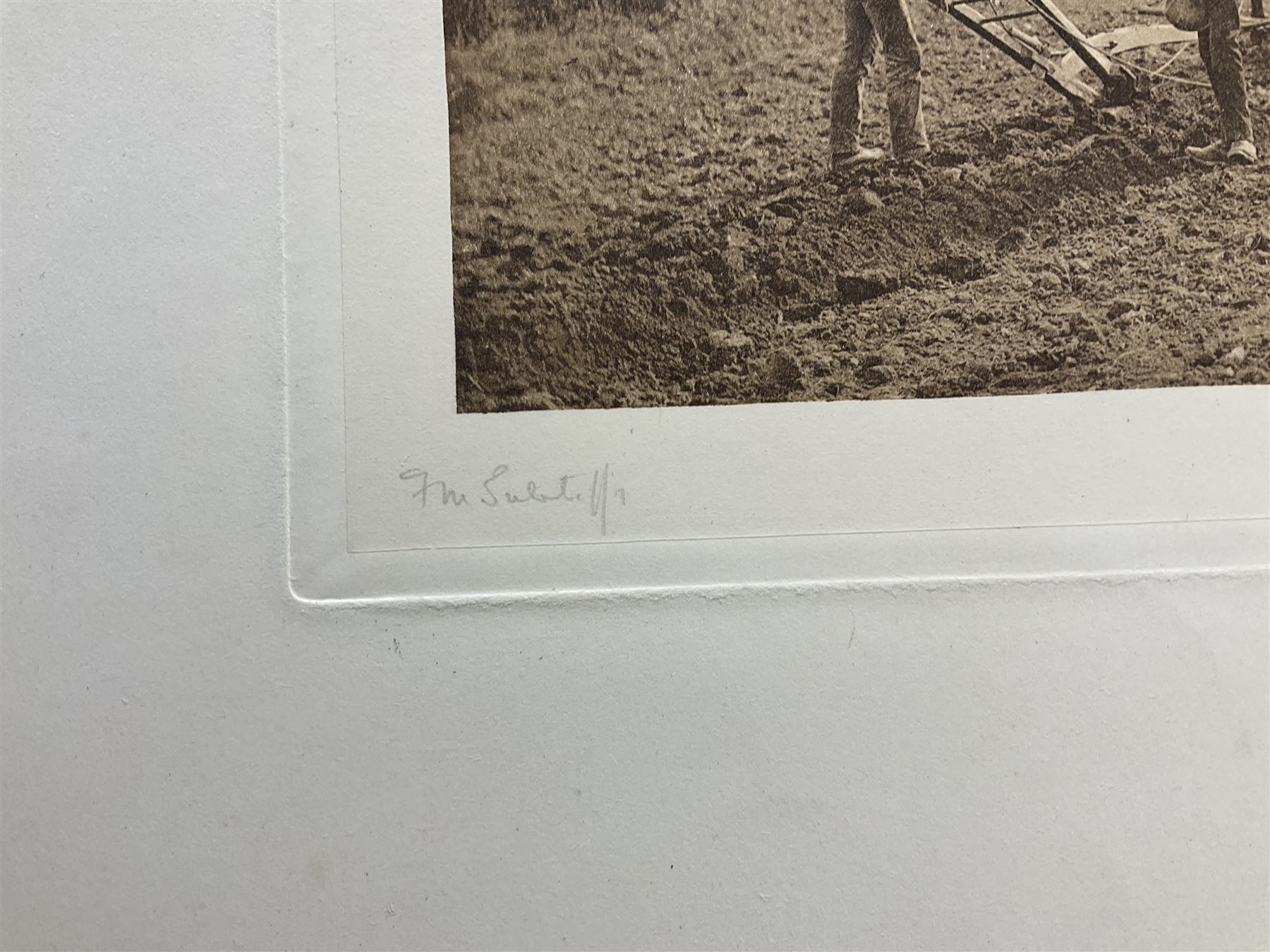 Frank Meadow Sutcliffe (British 1853-1941): 'Dinner Time' - Foulbriggs Field Lealholm Hall Farm, 19th century photographic print signed on the margin in pencil, with embossed border  15cm x 19.5cm; another similar mounted photograph of a Port scene (unframed) (2)