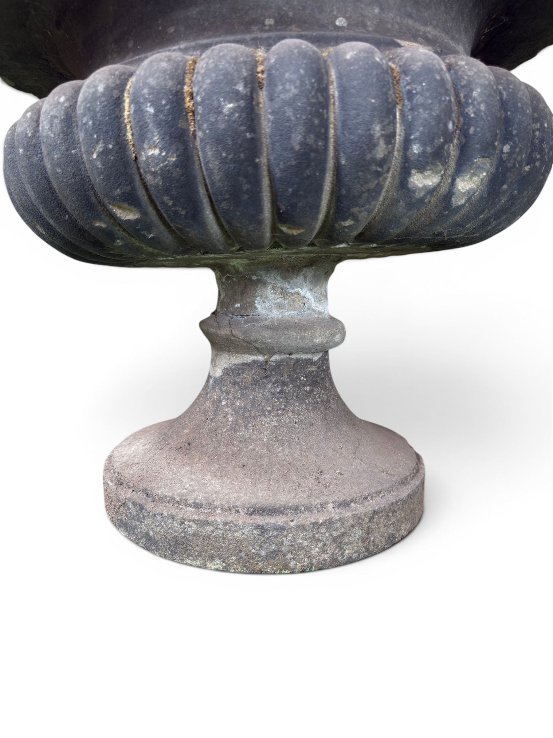 Carved sandstone garden urn, gadrooned campana form