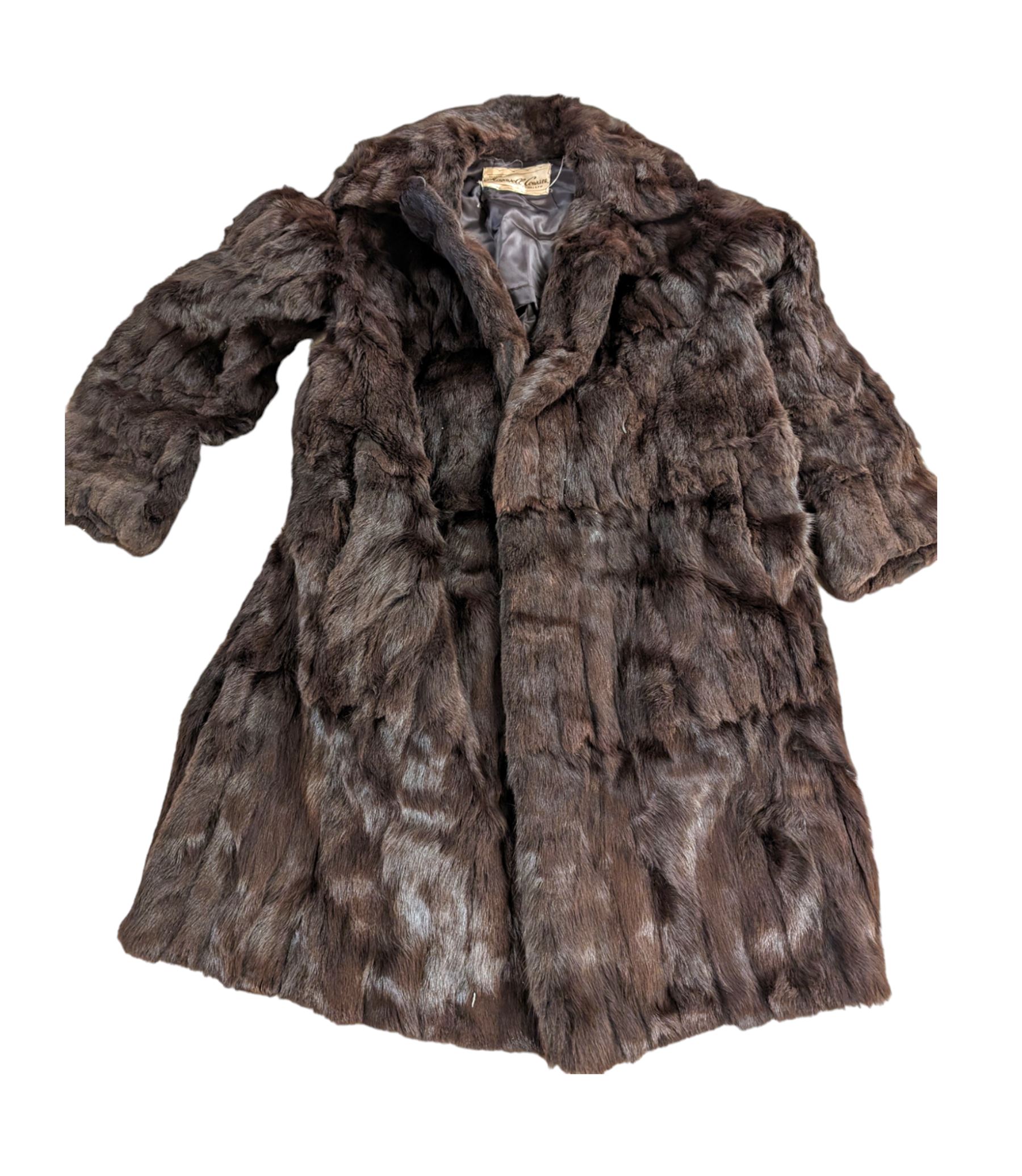 Two Waddingtons sheepskin coats, Maxwell & Cowan rabbit fur coat, Lykafur simulated mink fur coat, faux fur gilet and a leather jacket