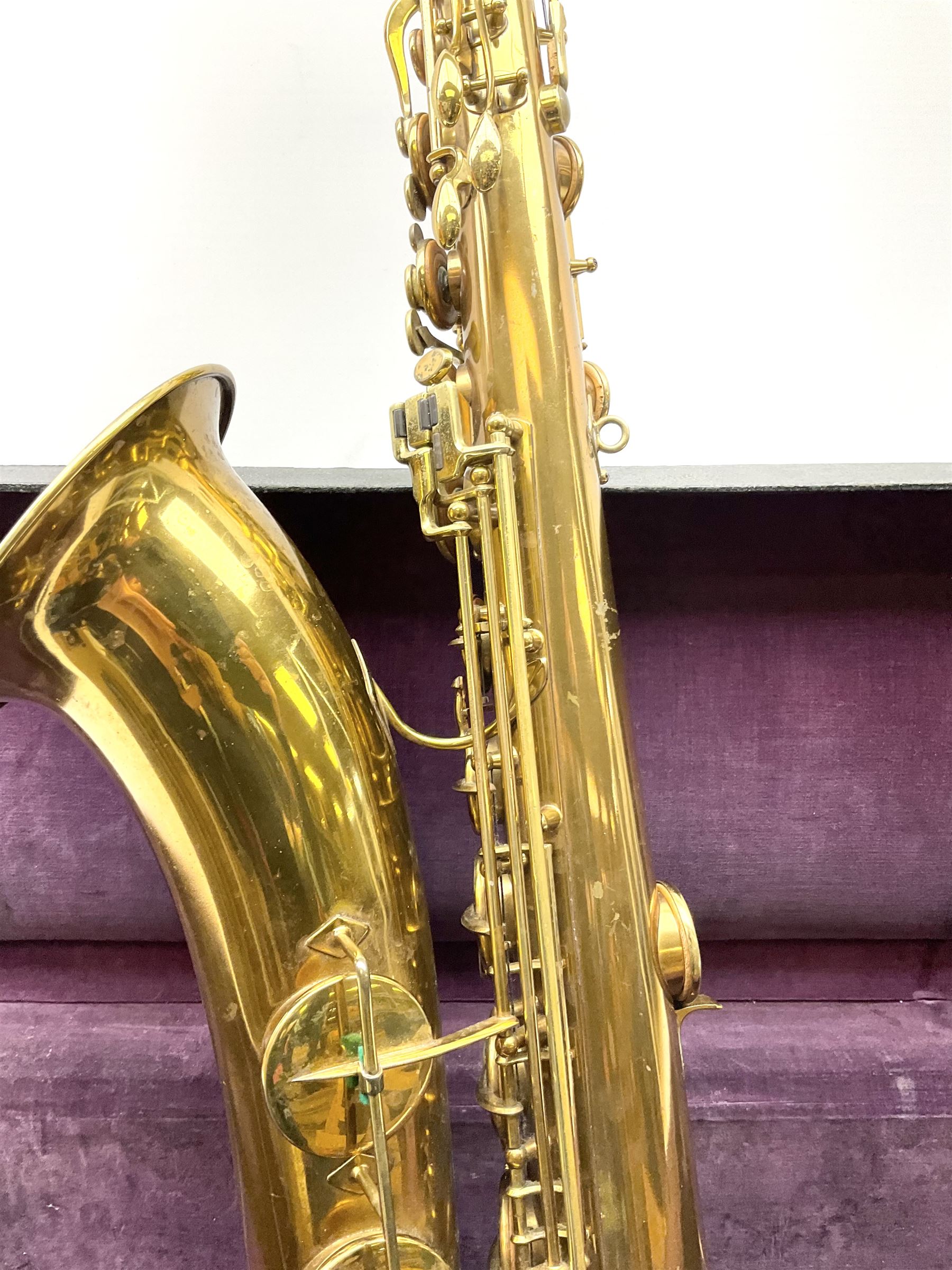 Brass tenor saxophone by Adolphe SAX, 84 Rue Myrha, Paris,  No.938 serial number 12097, H75cm excluding crook; in hard carrying case bearing plaque for Henri Selmer