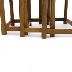 David 'Oakleafman' Langstaff - oak nest of three tables, each with a rectangular adzed top, with signature leaf motif on the bottom stretcher, from the workshop of David Langstaff, Easingwold, Yorkshire