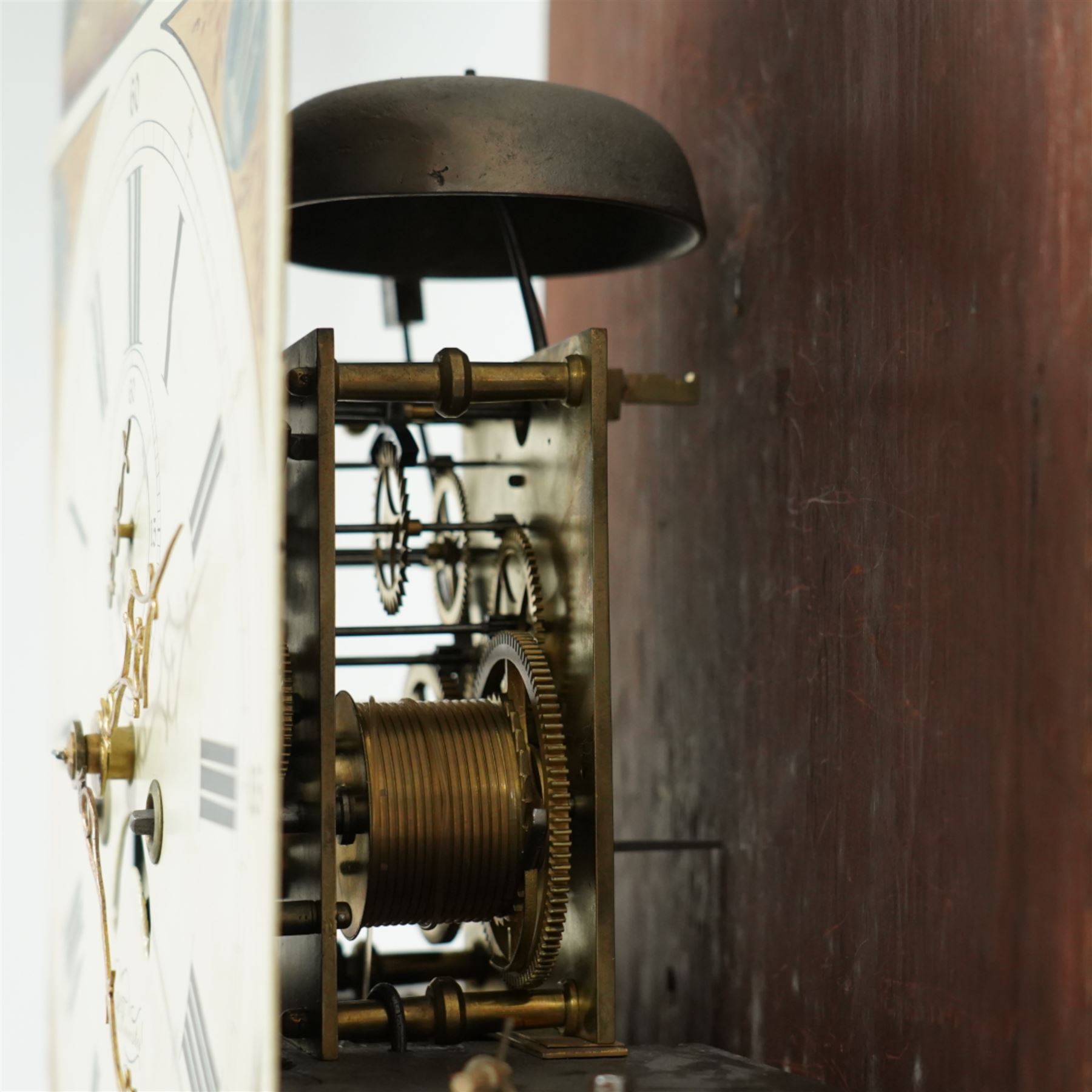 Patrick Forrester of Hull-early 19th century 8-day oak and mahogany longcase, c1830, With a pagoda pediment and three matching ball and spire finials, break arch hood door beneath flanked by reeded pilasters with brass capitals, trunk with canted corners and a full length break arch topped door with crossbanding, on a square plinth with an applied moulding to the base, fully painted dial with matching spandrels and a scene of a huntsman to the arch, with Roman numerals, fifteen minute Arabic's, stamped brass hands, seconds dial and date aperture, dial pinned via a falseplate to a rack striking movement, striking the hours on a bell. With key, weights and pendulum.   A good example of this refined design of case popular in the East Riding of Yorkshire and London, the hood is of particularly good proportions.
Patrick Forrester is listed as working in Hull 1813-1840, also as a Jeweller and Goldsmith.         