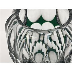 Val St Lambert style glass vase of shouldered ovoid form, cased in deep green over clear and heavily cut with repeat spherical pattern, indistinctly signed beneath ('Jac E. Dalmley'?), H15cm