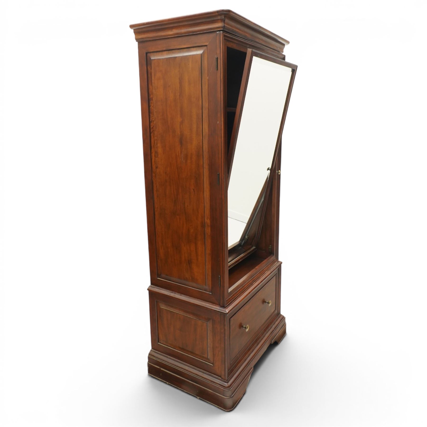 Willis & Gambier - hardwood swing mirrored door cabinet, in a dark cherrywood finish with moulded cornice over mirrored door incorporating adjustable cheval mirror action, enclosing a shelved interior, lower drawer with brass knob handles, panelled sides and stepped plinth base