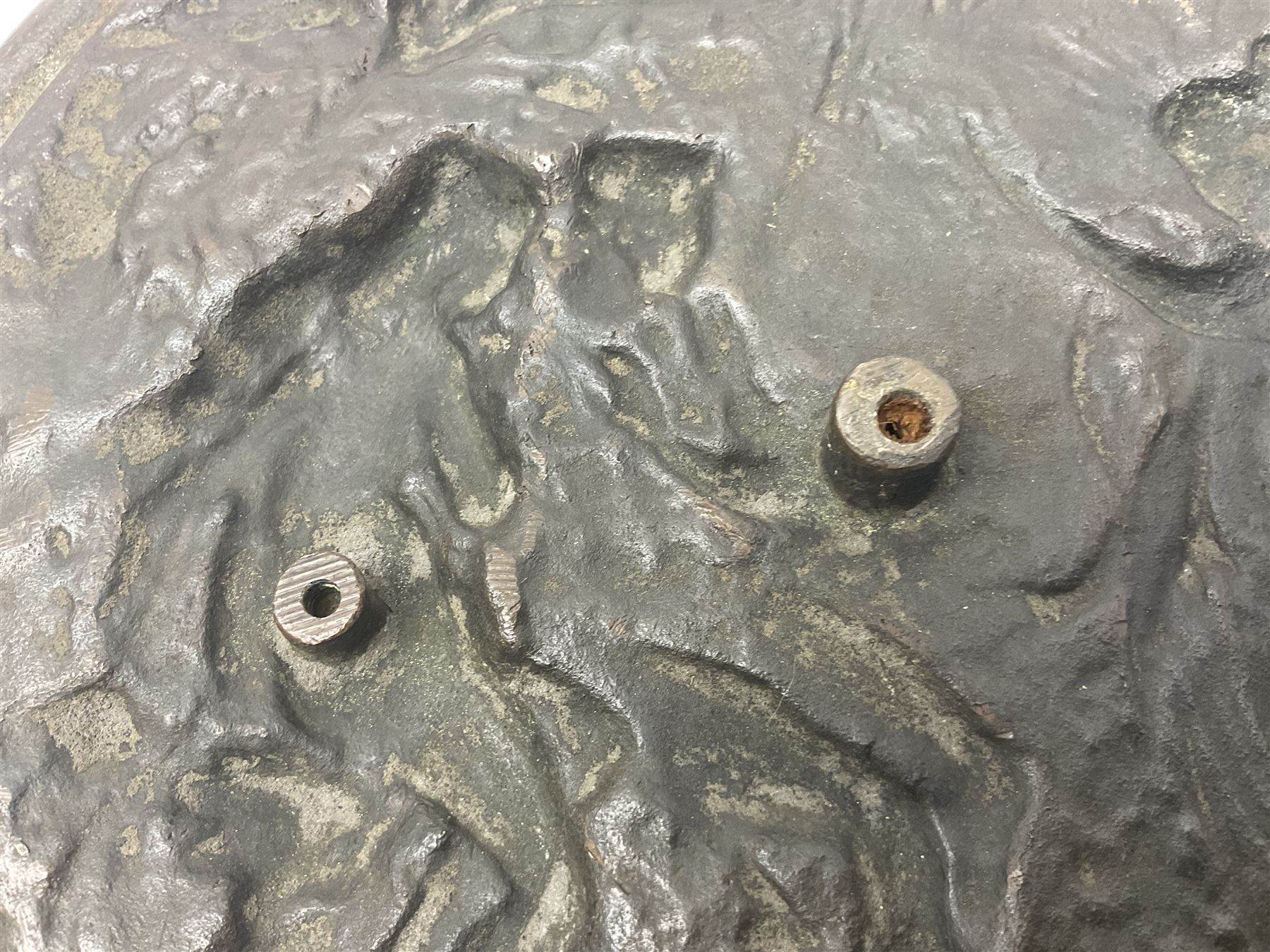 Late 19th century bronze plaque, of circular form, depicting the angel appearing to Adam and Eve in the garden of Eden in high relief, D25.5cm
