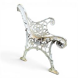 Pair of ornate painted cast iron bench ends, painted in white finish