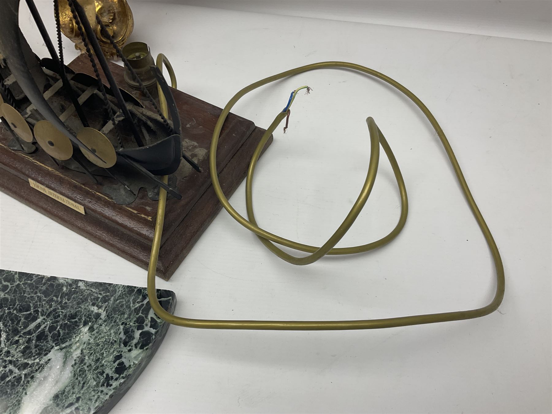 Five various giltwood and other hall brackets, one with marble top; and Viking ship table lamp