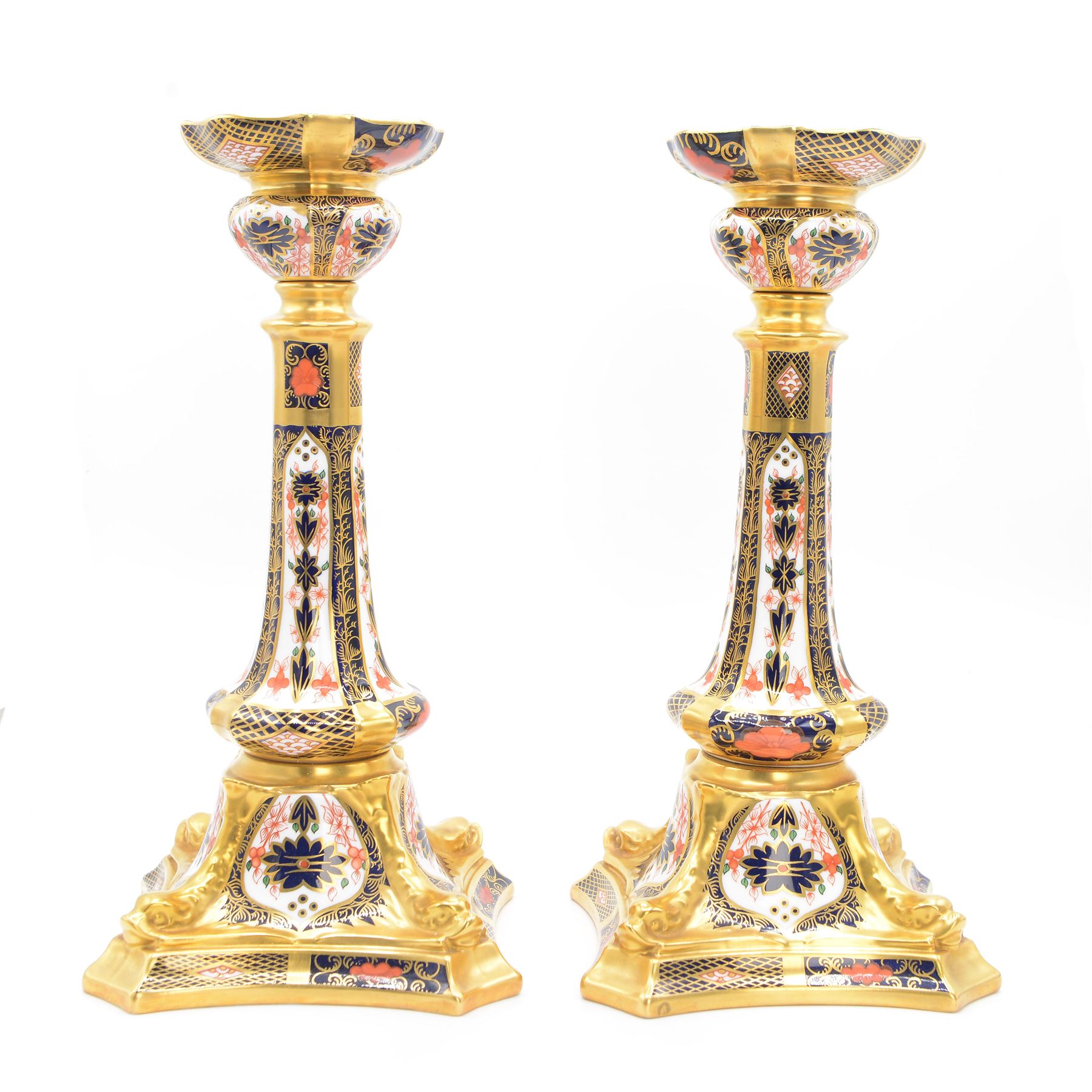 Pair of Royal Crown Derby Imari 1128 pattern candlesticks with printed marks beneath including year cypher for 1987, second quality, H27cm 