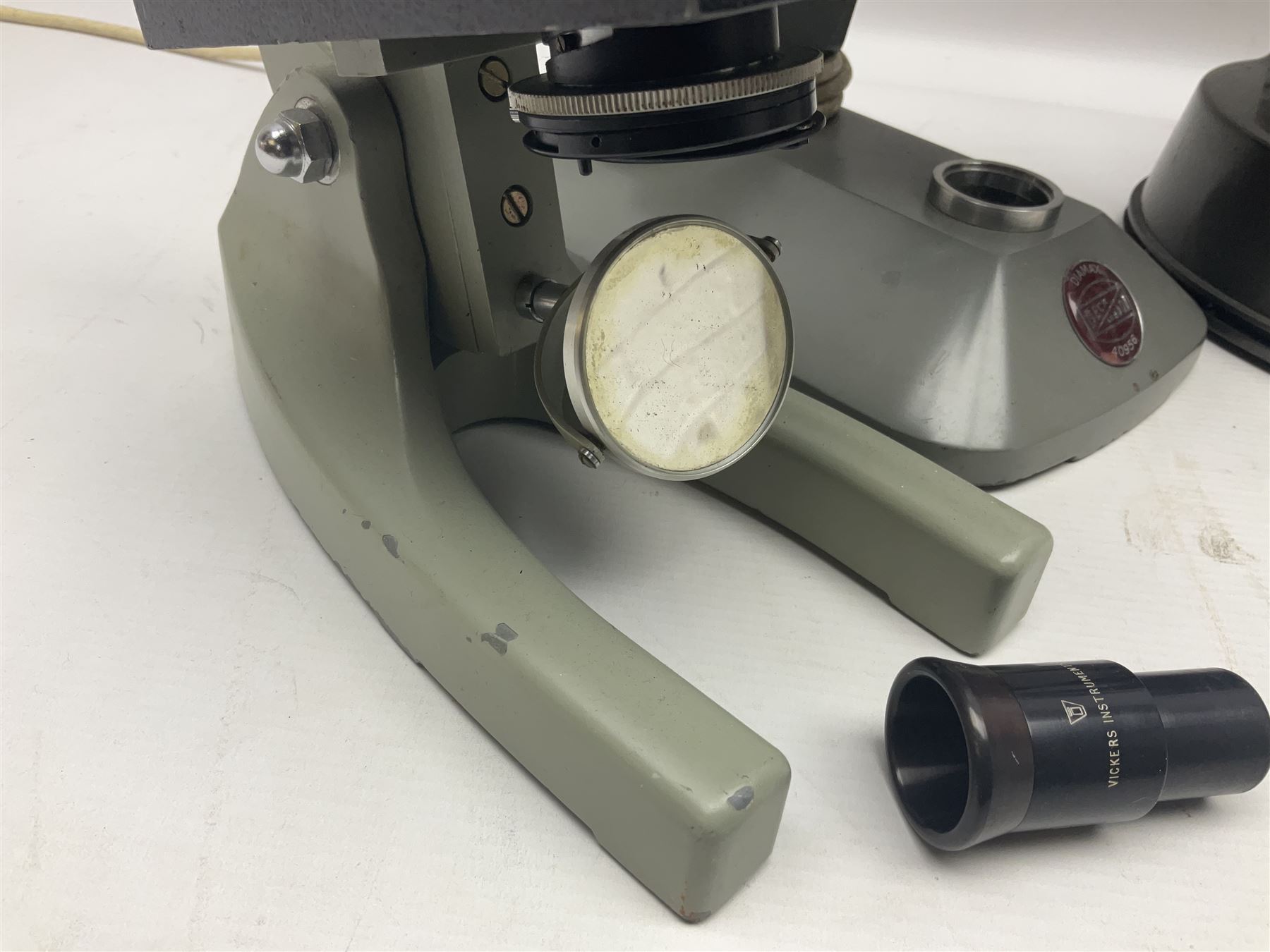 Four microscopes, comprising C Baker London Vickers, Back Diamax no 40956, Opax ABF no 232733 and one other 