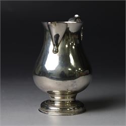 George II silver cream jug, of plain bellied form with capped scroll handle and sparrow beak, upon stepped circular foot, hallmarked London 1737, makers mark indistinct, H8.5cm
