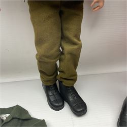 Palitoy Action Man Action Soldier No.34014 with tunic, belt, trousers, boots, blue beret and sten gun; in original box; and Palitoy Action Man Royal Military Policeman (RMP) gripping hands figure, marked 'Made in England by Palitoy under licence from Hasbro © 1964' to rear of torso; with tunic, shirt, trousers, tie, boots, belt, truncheon, pistol in holster, MP armband, red cap, Sterling machine gun and other clothing etc; in anrelated display box (2)