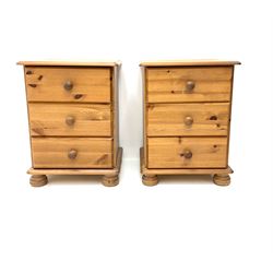 Pair polished pine bedside chests, two short drawers, pad supports 