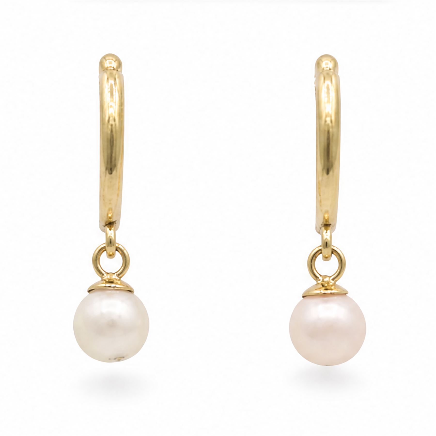 Pair of 9ct gold pearl pendant earrings, each stud set with a single white pearl, stamped 375