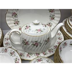 Minton Spring Bouquet pattern dinner and tea service, comprising dinner plates, twin handled tureens with covers, meat platter, teapot, milk jug, sugar bowl with cover, tea cups and saucers, bowls, cake plate, side plates, dessert plates, etc all with printed mark beneath (82)