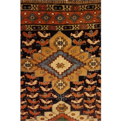  Persian multicoloured rug, field with lozenge and stylised birds within a triple repeating border, 200cm x 137cm  