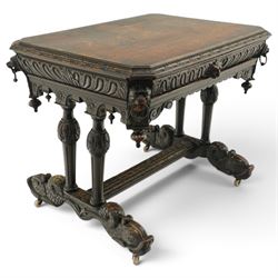 Victorian Jacobean Revival heavily carved oak centre table , rectangular top with canted c...