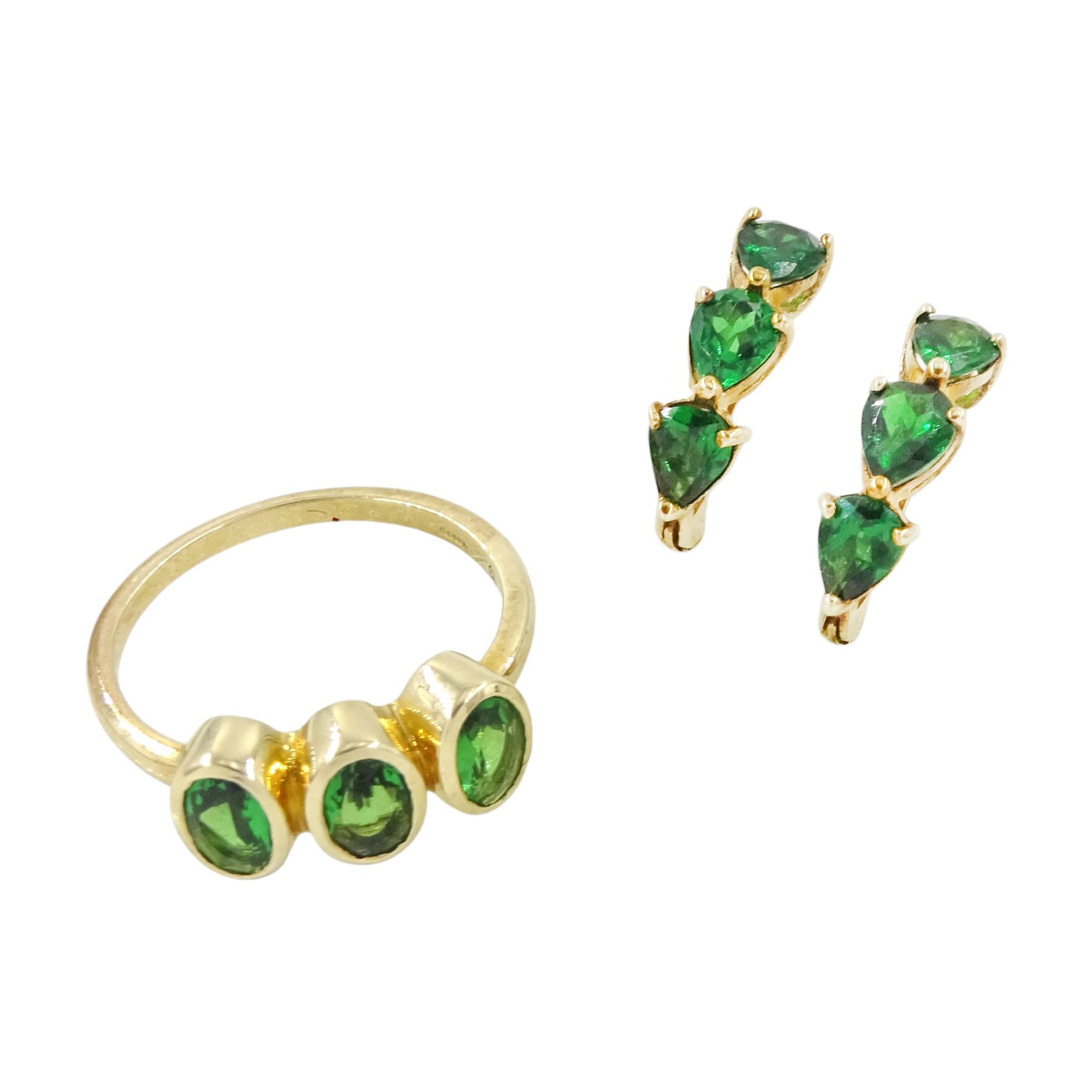 Gold tsavorite garnet ring and a pair of gold tsavorite garnet hoop earrings, both hallmarked 9ct