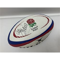 England Rugby official replica ball by Gilbert signed by Mike Tindall, together with a FIFA football
